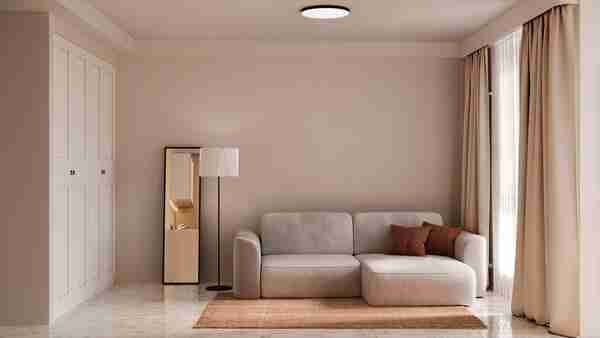 A bright, minimal living room with soft natural light